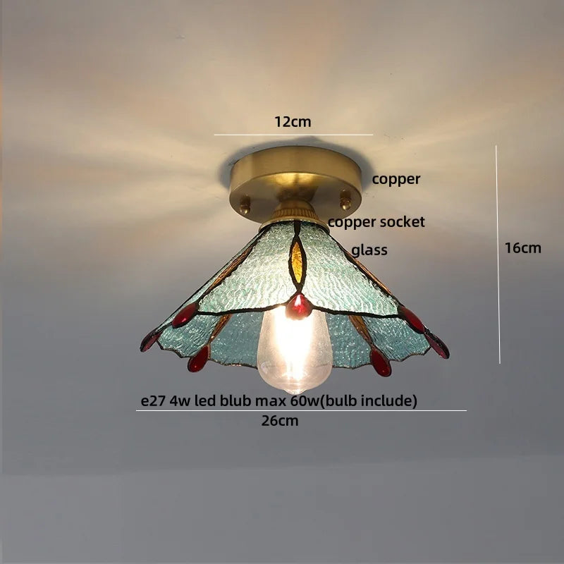 Ceiling light fixture with stained glass shade and measurements on a plain background