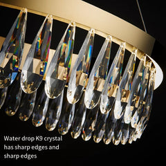 Chandelier with clear crystal droplets on a black background