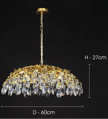 Gold chandelier with crystal details on a black background