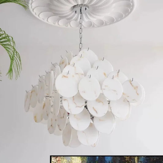 White faux alabaster marble disc chandelier with a polished chrome frame hanging from a ceiling medallion.