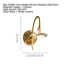 Gold Floral Sconce with White Ceramic Flower and Curved Arm
