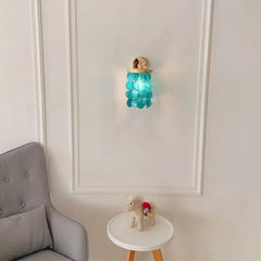 Gold Sconce with Tiered Capiz Shells and Wave Arm