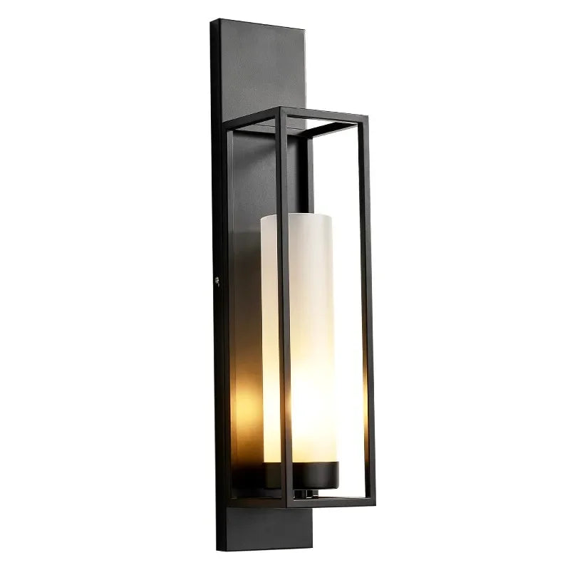 Modern wall-mounted outdoor light fixture with black frame and white glass on a white background