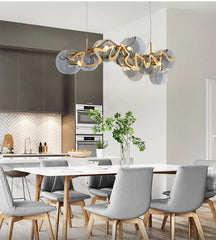 Gold Wave Chandelier with Clear Glass Disc Shades and Brass Accents