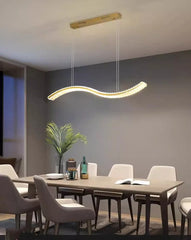 Modern dining room with a hanging LED pendant light