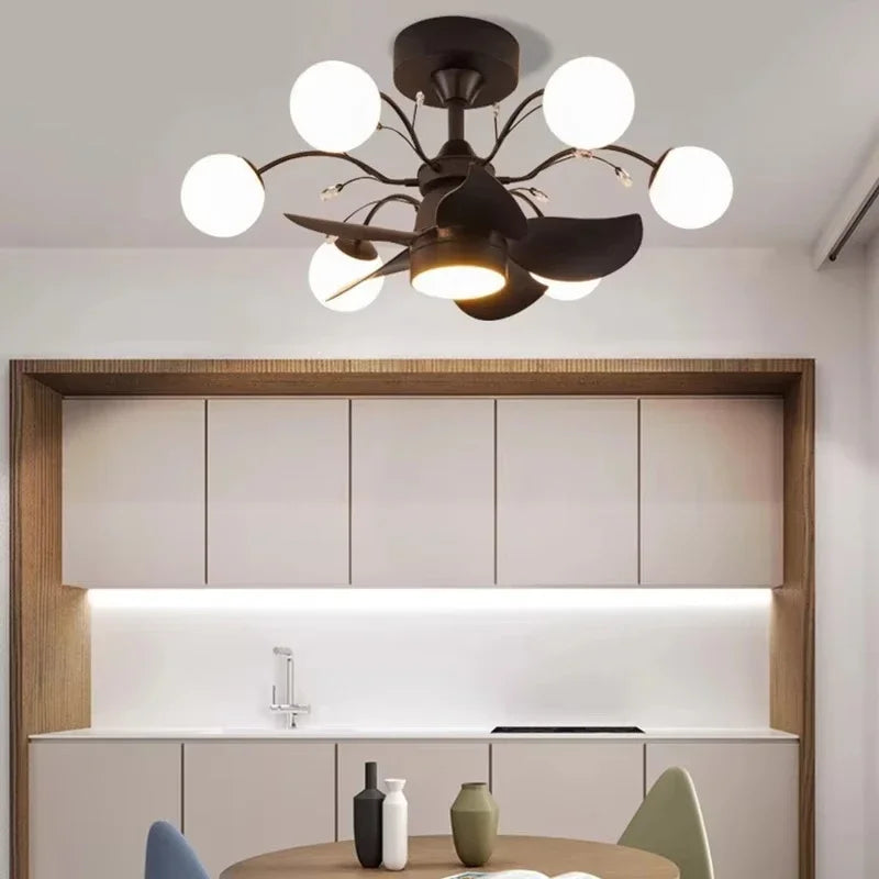 Modern kitchen with a chandelier above a dining table