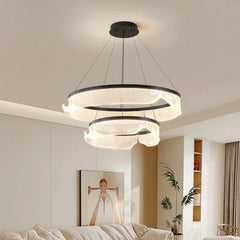 Modern chandelier in a living room setting with neutral colors