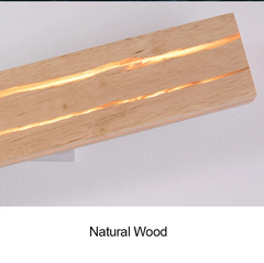 Wooden light fixture with embedded lights on a grey background.