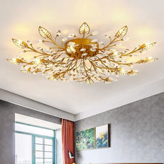 Gold crystal leaf semi-flush ceiling light fixture with warm lighting in a bedroom