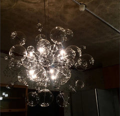 Chandelier with glass bubbles hanging from the ceiling