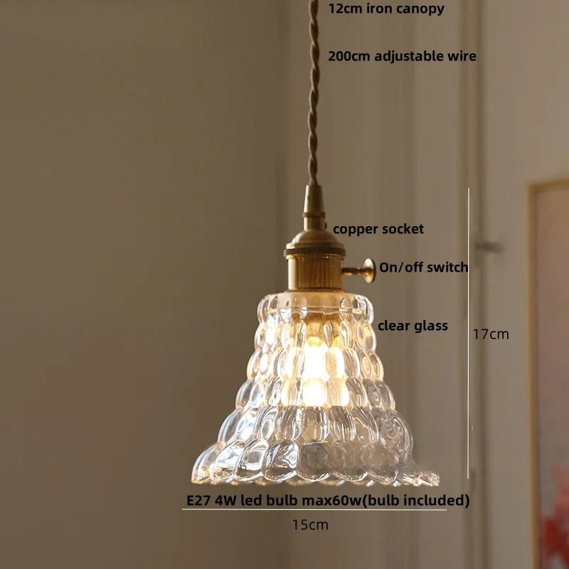 Vintage-style pendant light with clear glass shade and labeled dimensions on a neutral background