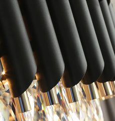 Close-up of black and gold cylindrical objects with a blurred background