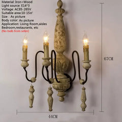Decorative wall sconce with dimensions and specifications on a plain background