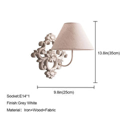 Dimensions of a gray-white wood wall sconce with fabric shade, showing height of 13.8in (35cm) and width of 9.8in (25cm).
