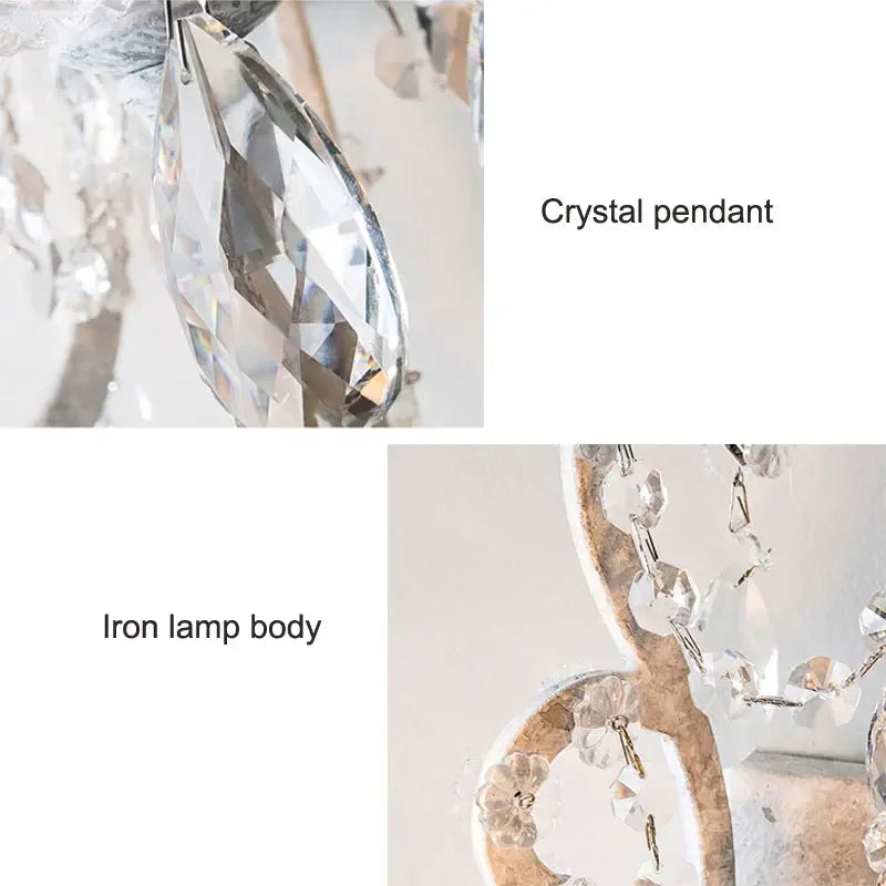 Close-up of a crystal pendant and iron lamp body with text labels.