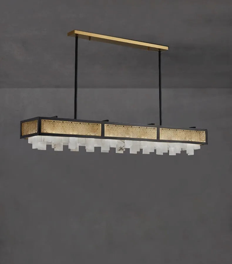 Modern pendant light fixture with gold accents on a gray background