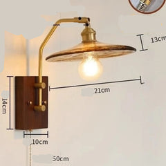 Wall-mounted lamp with adjustable arm and measurements on a light background