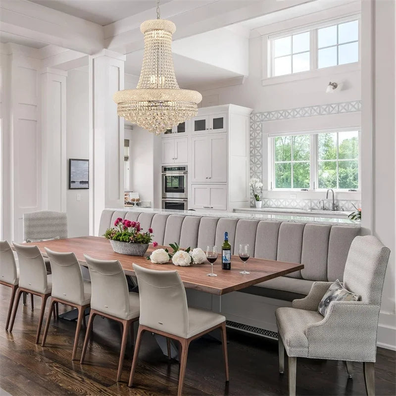 Modern kitchen with a dining table and bench seating area.