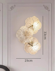 Wall-mounted floral light fixture with dimensions and specifications on a gray wall background