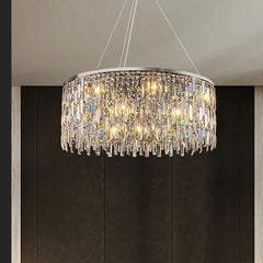Crystal chandelier hanging against a dark background