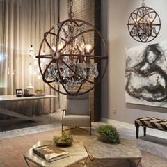 Living room with decorative chandeliers, a chair, and a coffee table.