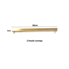 Gold iron with dimensions labeled on a white background