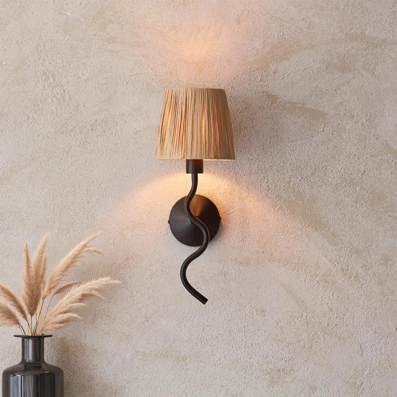 Decorative wall sconce with a textured wall background