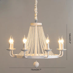 Chandelier with crystal accents and candle-style lights on a neutral background