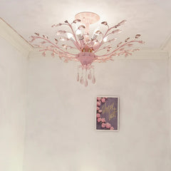 Pink floral semi-flush ceiling light with crystal accents in a room with a framed picture on the wall.