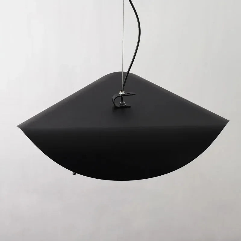 Black pendant light on a white background