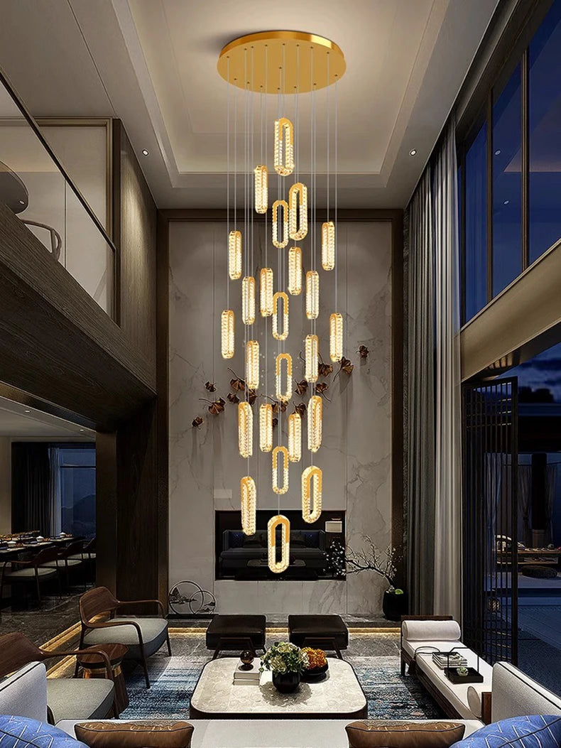 Modern interior with a large chandelier hanging from the ceiling.