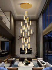 Modern interior with a large chandelier hanging from the ceiling.