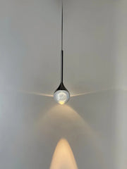 Glass Globe Pendant Light with Textured Moon Detail