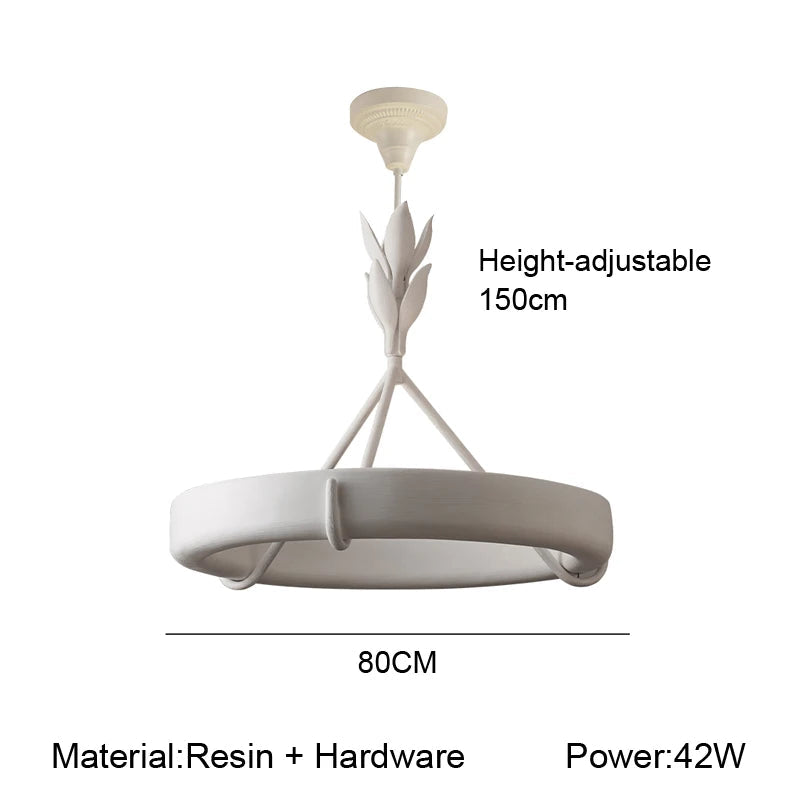 Ceiling light fixture with leaf design, on a white background.