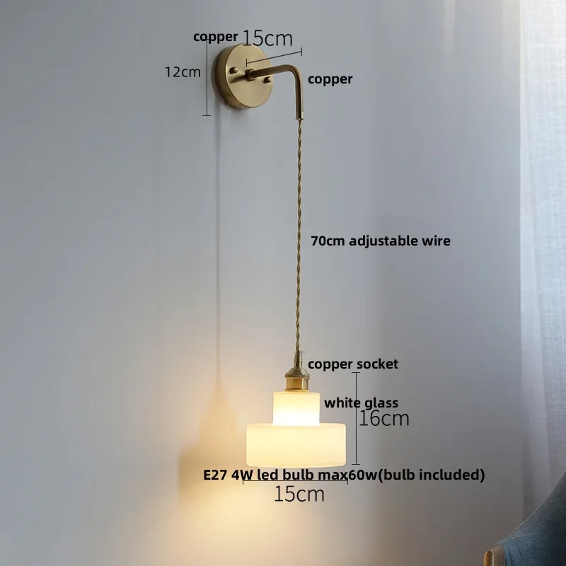 Wall-mounted light fixture with labeled dimensions on a plain background