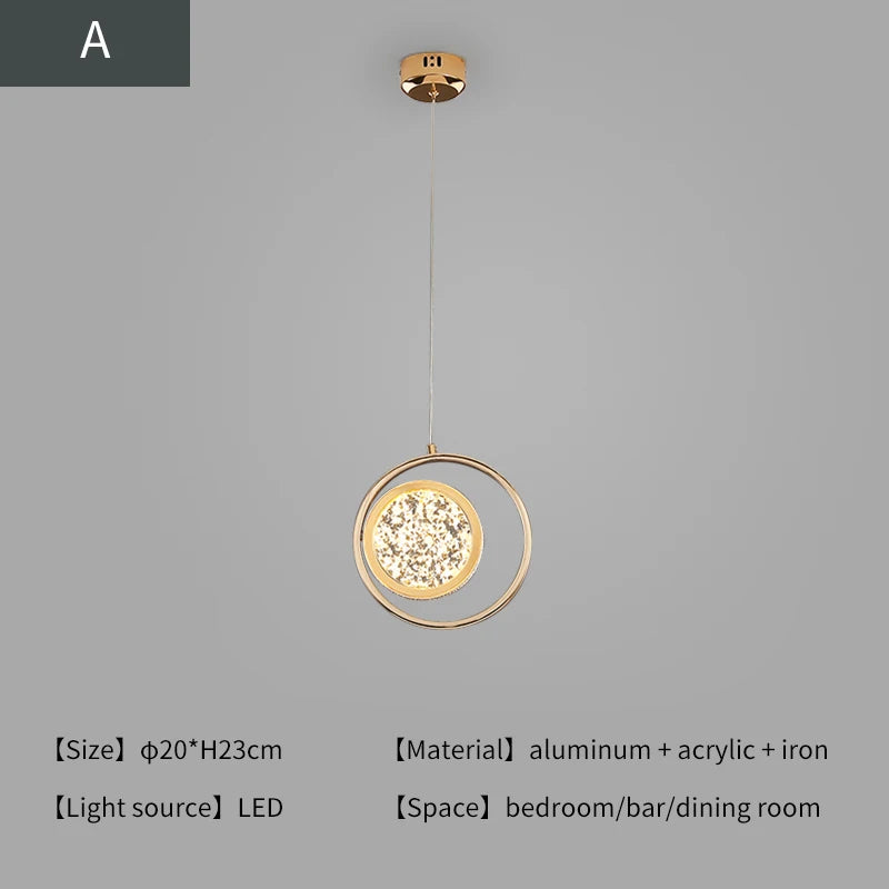 Gold pendant light with circular design on a gray background