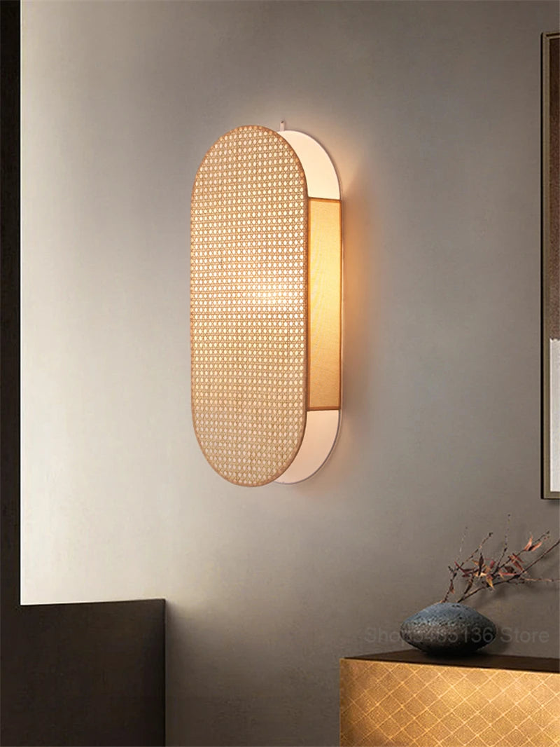 Modern wall lamp with textured design on a neutral wall
