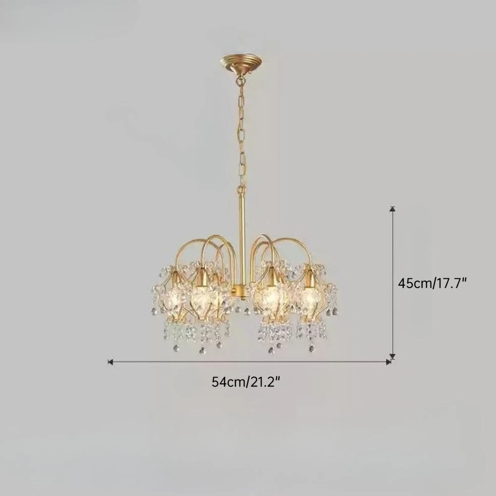 Gold chandelier with crystal accents and dimensions on a gray background