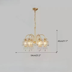 Gold chandelier with crystal accents and dimensions on a gray background