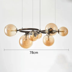 Chandelier with gold glass bulbs and metal frame on a white background, showing dimensions.