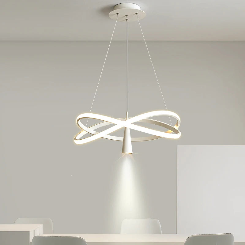 Modern pendant light hanging in a room with a neutral background