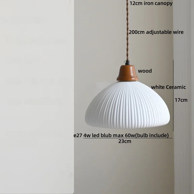 Pendant light with measurements on a plain background