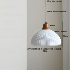 Pendant light with measurements on a plain background