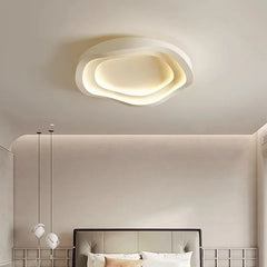 A different angle of the modern flush mount ceiling light, emphasizing its unique, abstract form and how it integrates with the ceiling.