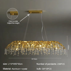 Gold chandelier with crystal pendants on a dark background, showing adjustable height feature.