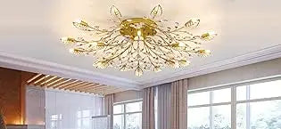 Gold ceiling light fixture in a room with large windows
