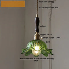 Green pendant light with detailed specifications on a neutral background