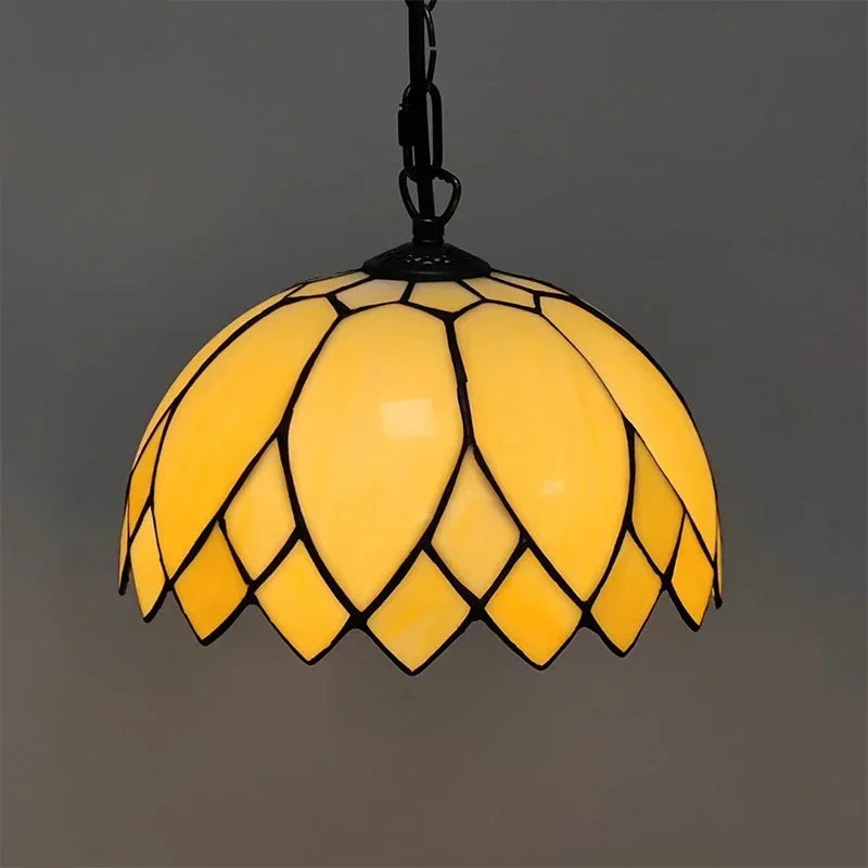 Yellow dome-shaped Tiffany style stained glass pendant light with black leading