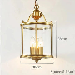 Gold Lantern Pendant Light with Clear Glass Shade and Metal Frame