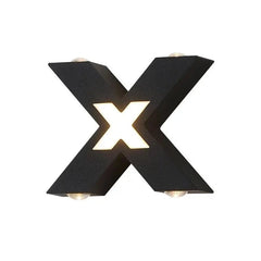 Black letter 'X' wall light fixture on a white background
